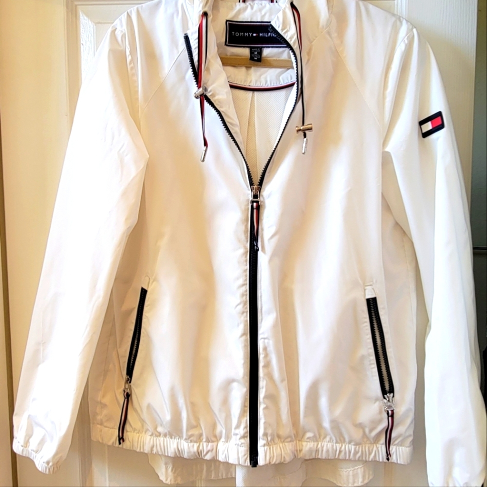 White windbreaker.